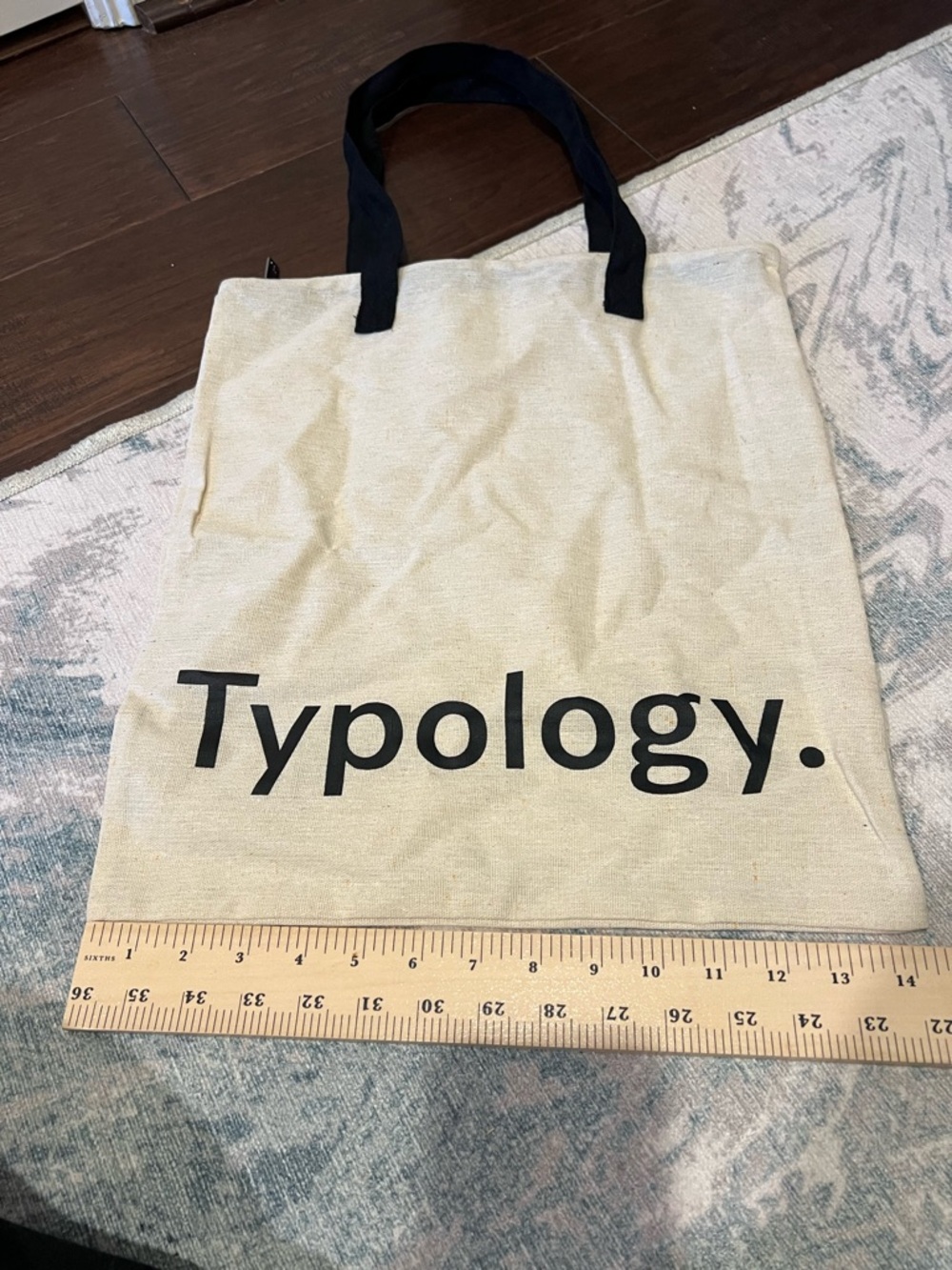 Typology. Canvas Tote Bag in Cream with Black Handles